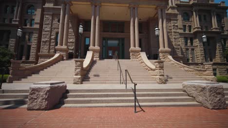 Pan-up-wide-angle-shot-of-the-Tarrant-County-Courthouse-in-Fort-Worth,-Texas