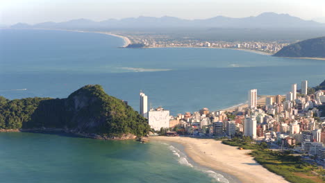 high-altitude aerial view of coastal caiobá beach with popular tourism side surrounded by the atlantic ocean, matinhos, guaratuba, paraná, brazil