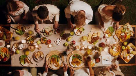 friends enjoying a garden dinner party