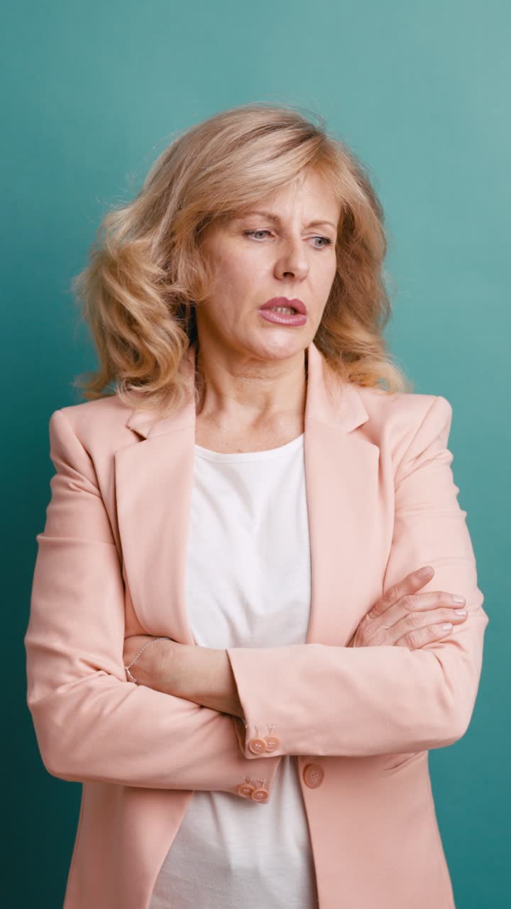 Mature Woman with Serious and Disapproving Facial Expression