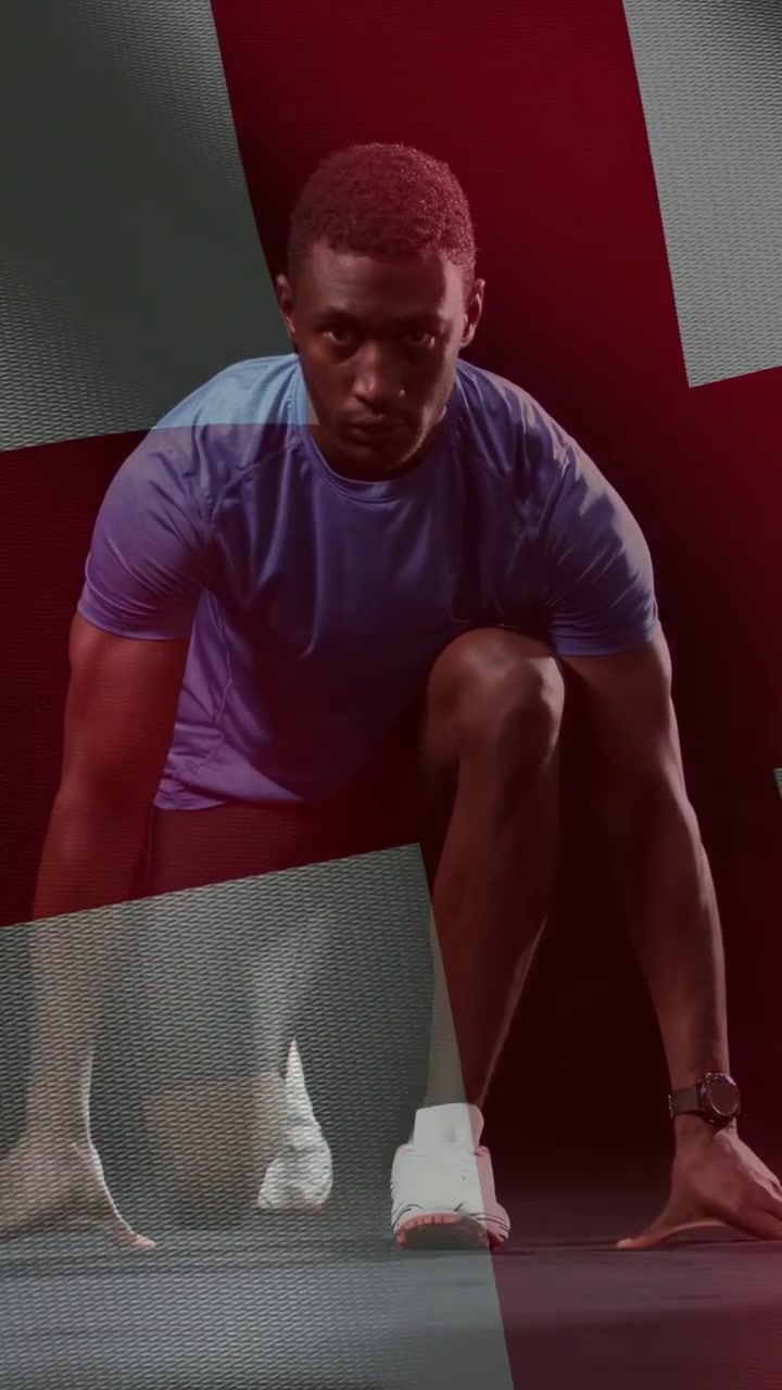 Vertical video: Man reacting to red-gray sweep, moving into fitness sprint start with watch visible