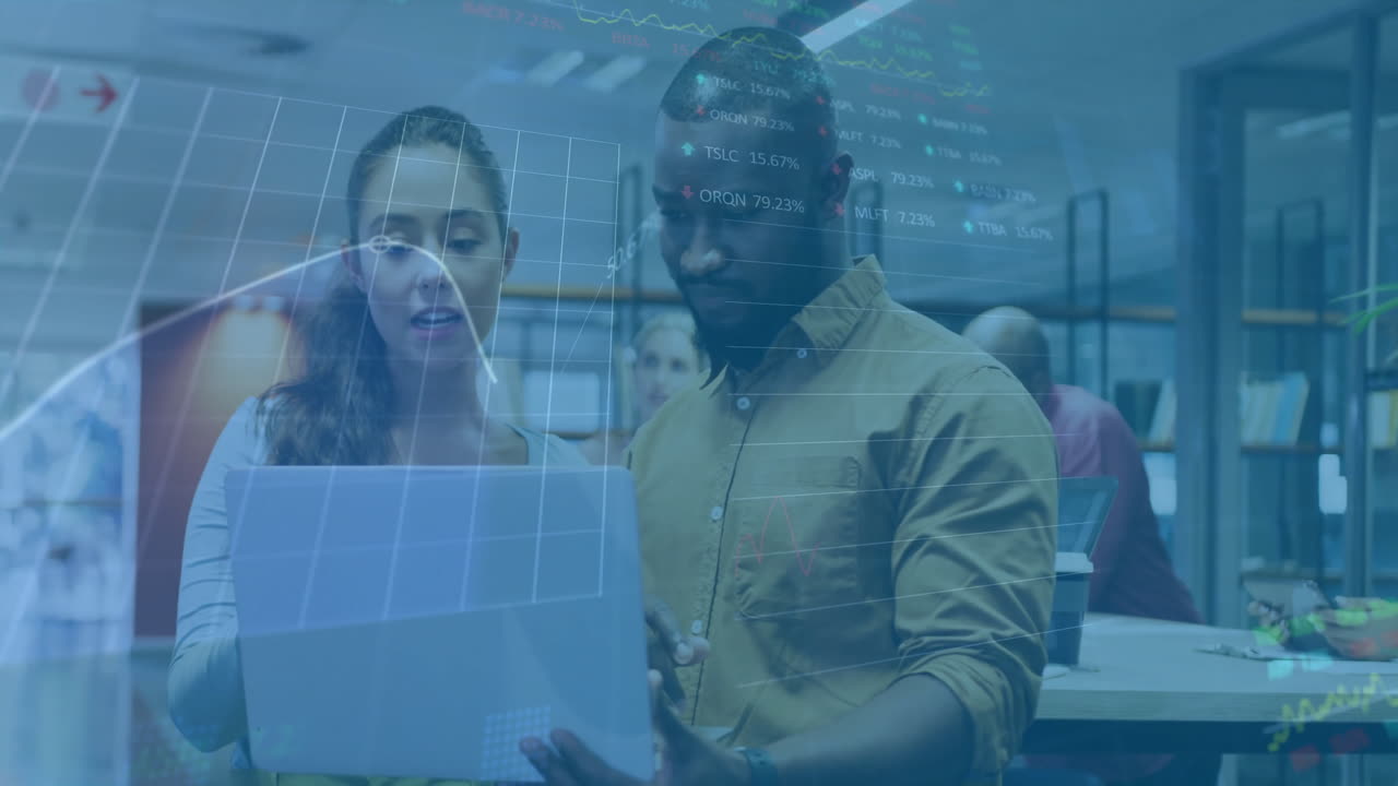 Animation of financial data processing over diverse business people using laptop