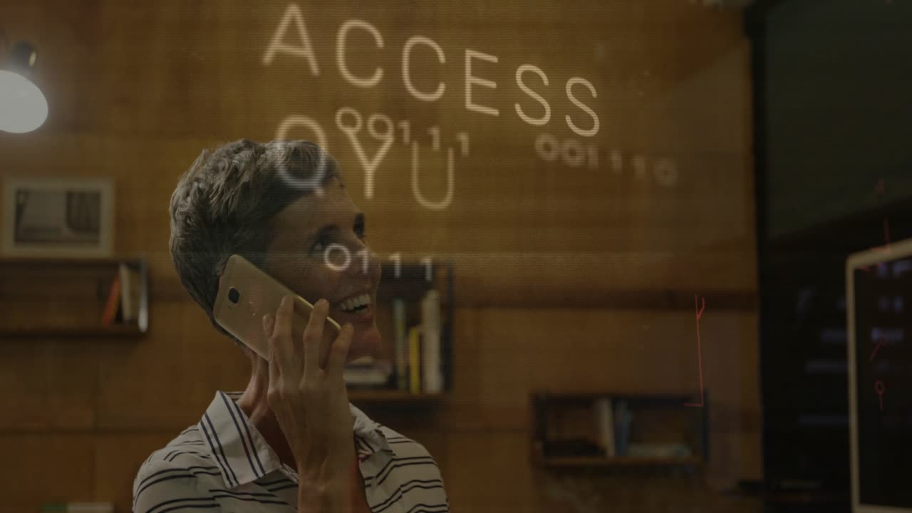 Woman calling on smartphone in office watching binary overlay changing from ACG to ACCESS DENIED