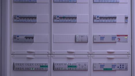 modern electrical panel setup featuring multiple circuit breakers and control modules in an organized grid layout