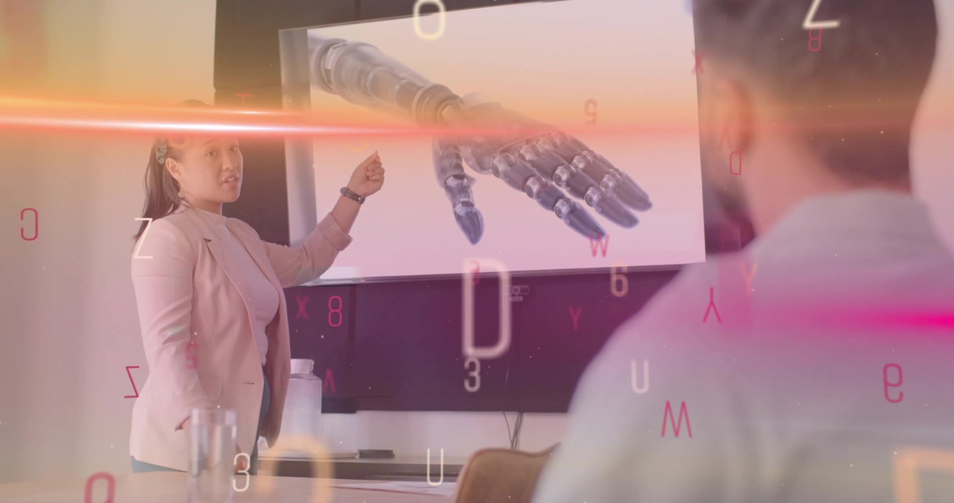 Presenter pointing at screen in tech office, explaining robotic arm as data fragments intensifying