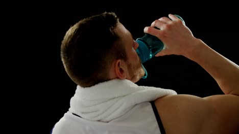 senior boxer leaning against the punching bag 4k
