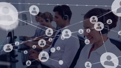 Animation-of-network-of-connection-with-icons-over-business-people-wearing-phone-headsets