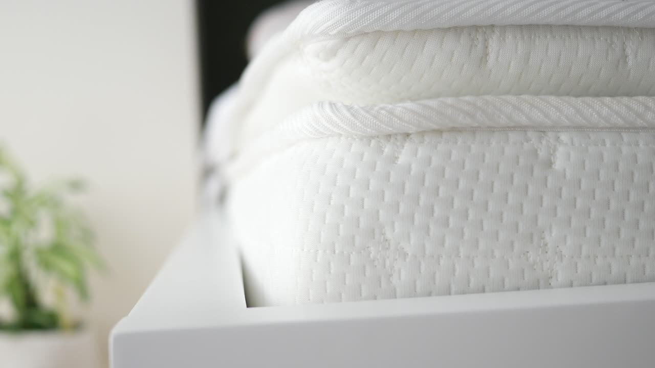 Close-up of a white mattress corner