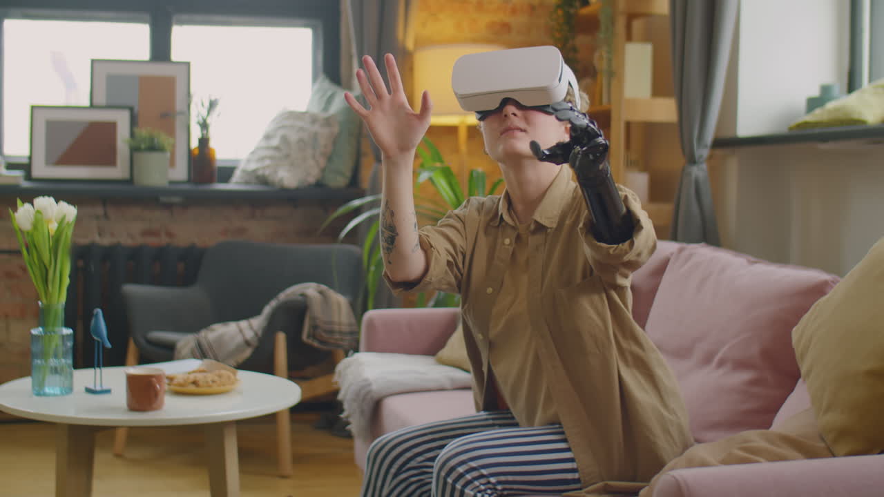 Cheerful Girl with Prosthetic Arm Using VR Headset in Living Room