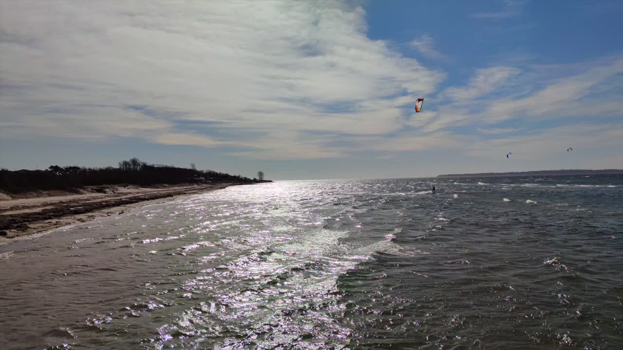 Kite Surfing on a Sunny Beach