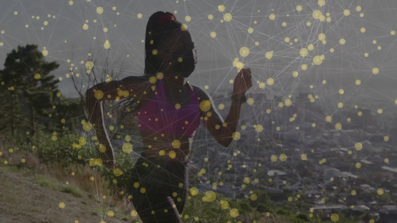 Runner entering frame activating yellow network overlay scanning skyline jogging onward for fitness