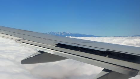 fly over atlas mountains mountain range in north africa morocco above clouds