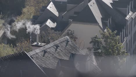 medium shot captured from a handheld camera showcases a top-down view of a peaceful neighborhood