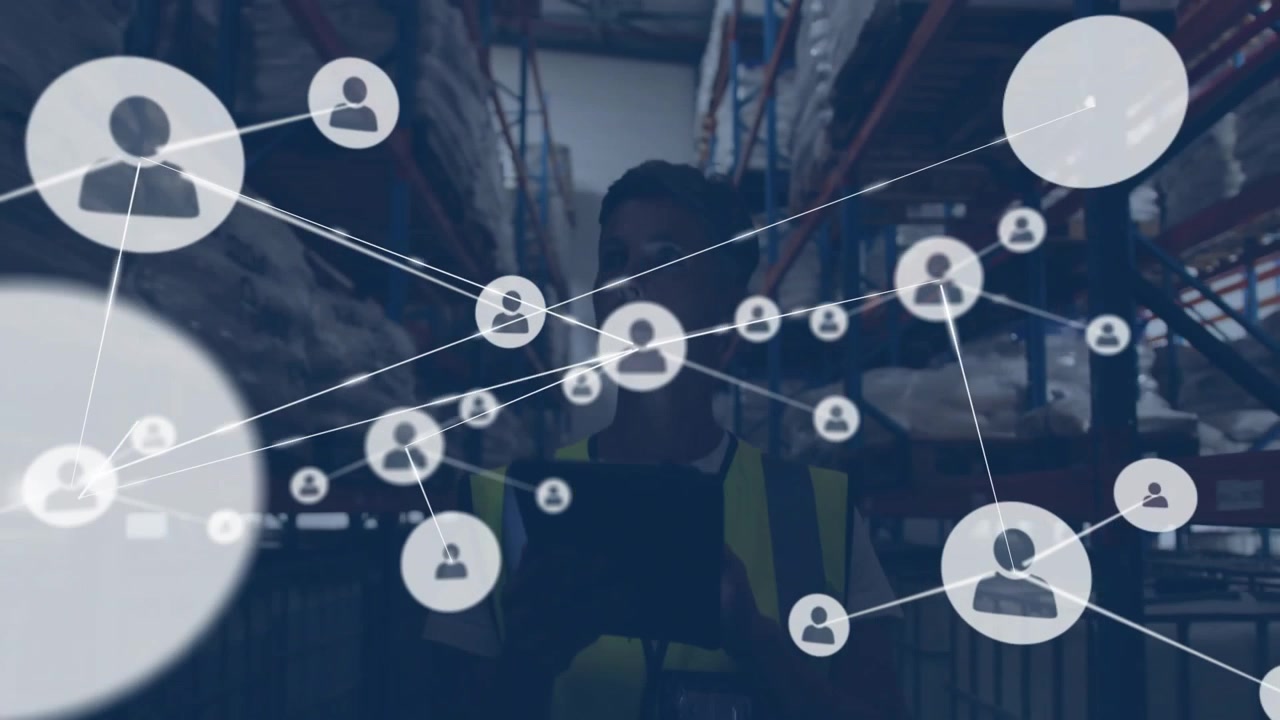 Warehouse manager scanning tablet screen, creating inventory data nodes forming expanding graph