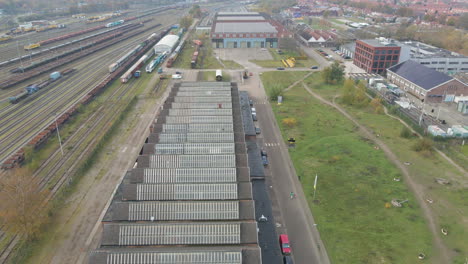 aerial of old train workshops on train yard