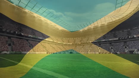 animación de agitar la bandera de jamaica contra la vista de un estadio deportivo