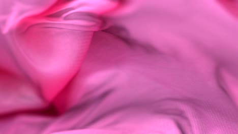 pink cloth or silk waving at wind in slow, loop