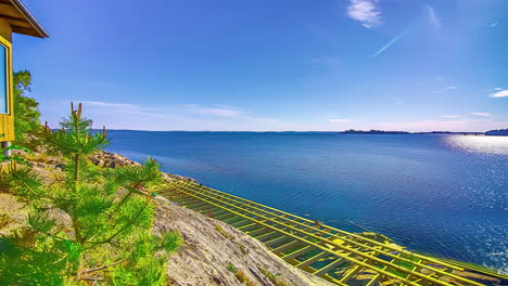 Time-lapse-of-plant-grow-and-building-a-yellow-deck-close-to-the-Nordic-sea-transition