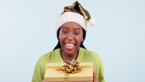 Christmas,-surprise-and-gift-with-black-woman