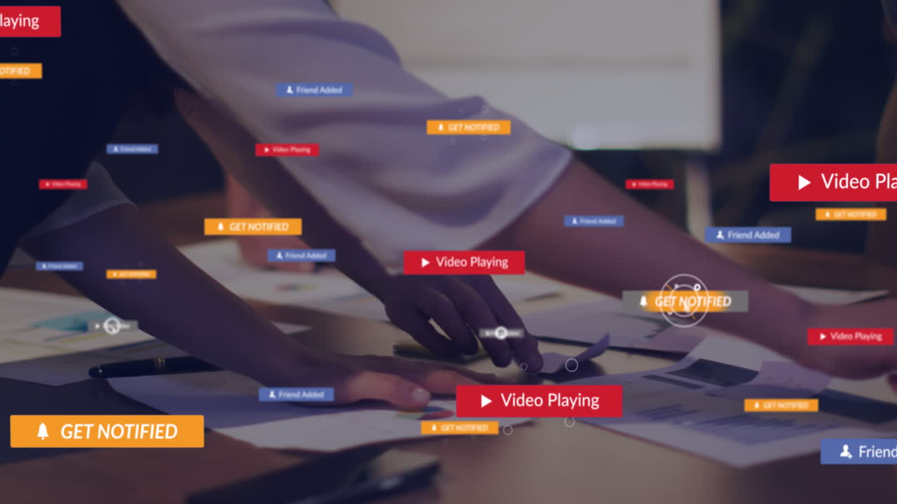 Animation of social media icons with texts over diverse business people working at office