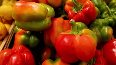 colorful bell peppers displayed at a market