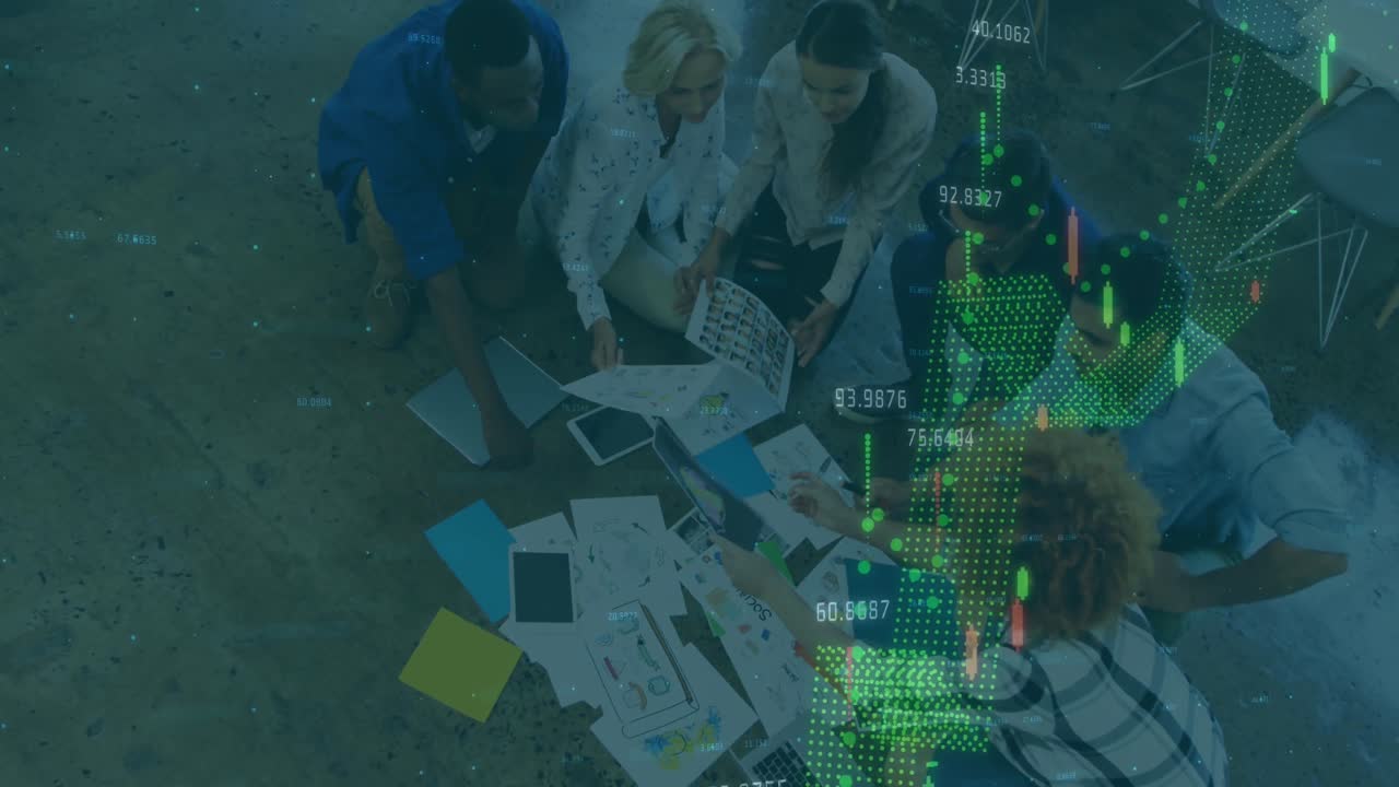Animation of financial data processing over diverse colleagues discussing over documents at office