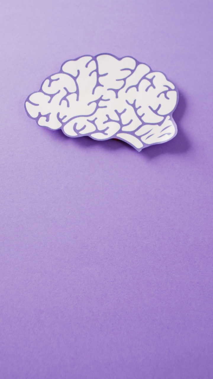 Close up of paper brain on purple background with copy space | Premium ...
