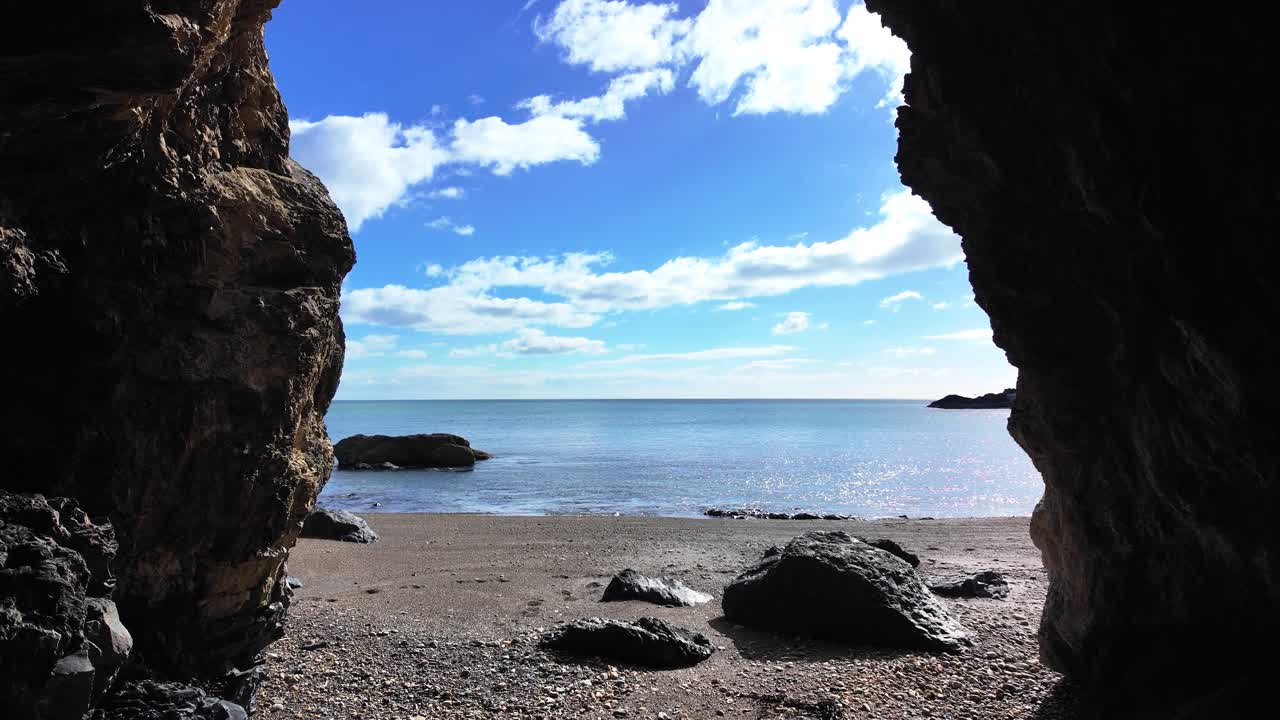 Gentle seas to horizon from a cave Copper Coast Waterford Ireland