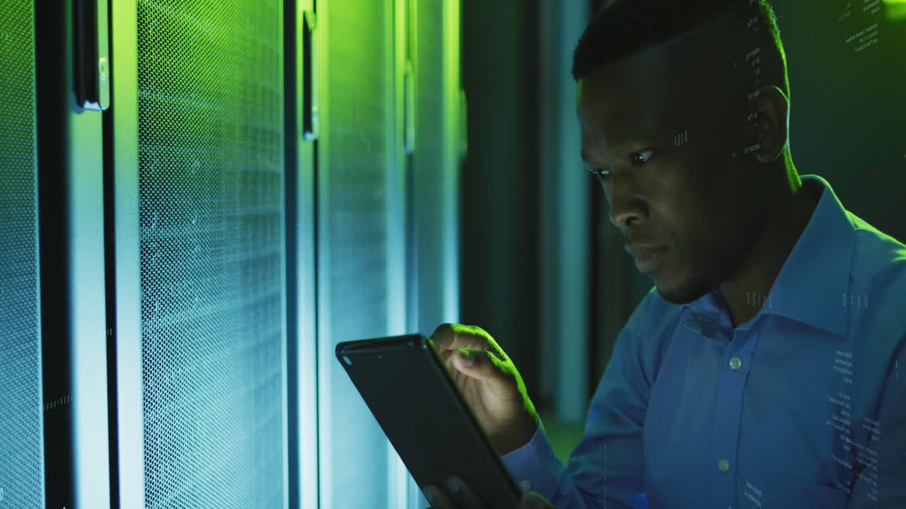 Animation of data processing over african american male it engineer and computer servers