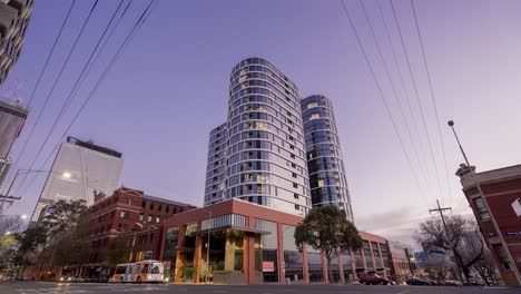 melbourne village apartment dynamic city sunset to dusk timelapse with cotton candy clouds