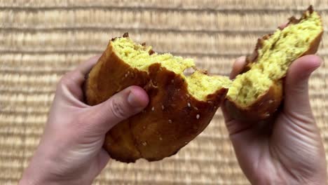 a hot delicious sweet traditional flat bread like cookies cake smooth soft yellow texture persian arabic bread in middle east from rural home made bakery in woodfire clay circle round old oven iran