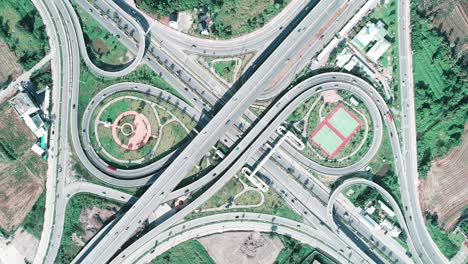 time-lapse or hyper-lapse aerial view highway road circle or intersection traffic for transportation concept.