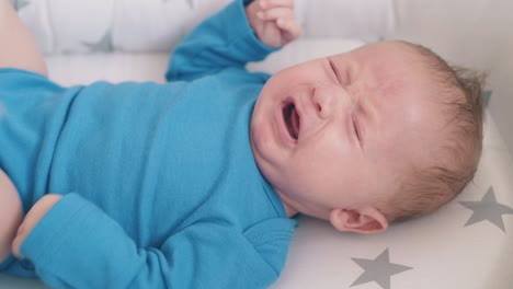 mommy-takes-pacifier-to-feed-awoken-little-son-with-milk