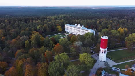 kemeri water tower with latvian flag in the kemeri resort park in jurmala, latvia