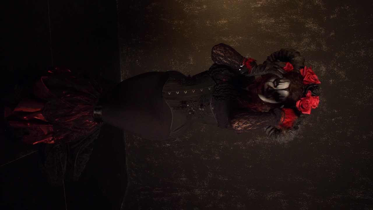 Elegant Calavera Catrina in a Dark and Spooky Halloween Costume