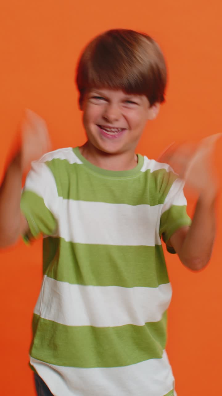 Young preteen child boy kid celebrating success winning birthday lottery jackpot goal achievement