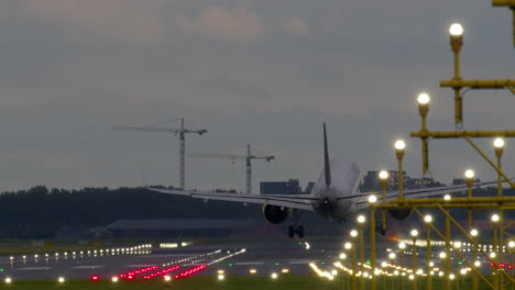 airplane landing at dusk