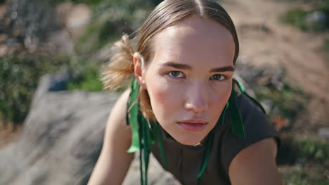 attractive model posing hill path closeup. outdoor girl face at rocky mountains