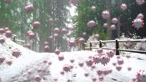 animation of covid 19 cells moving over winter scenery with snow covered landscape and snow falling