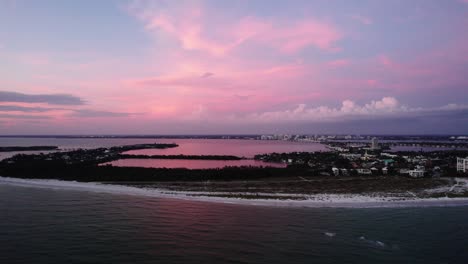 beautiful florida sunset in sarasota. panning shot of beach, skyline. 29.97 fps