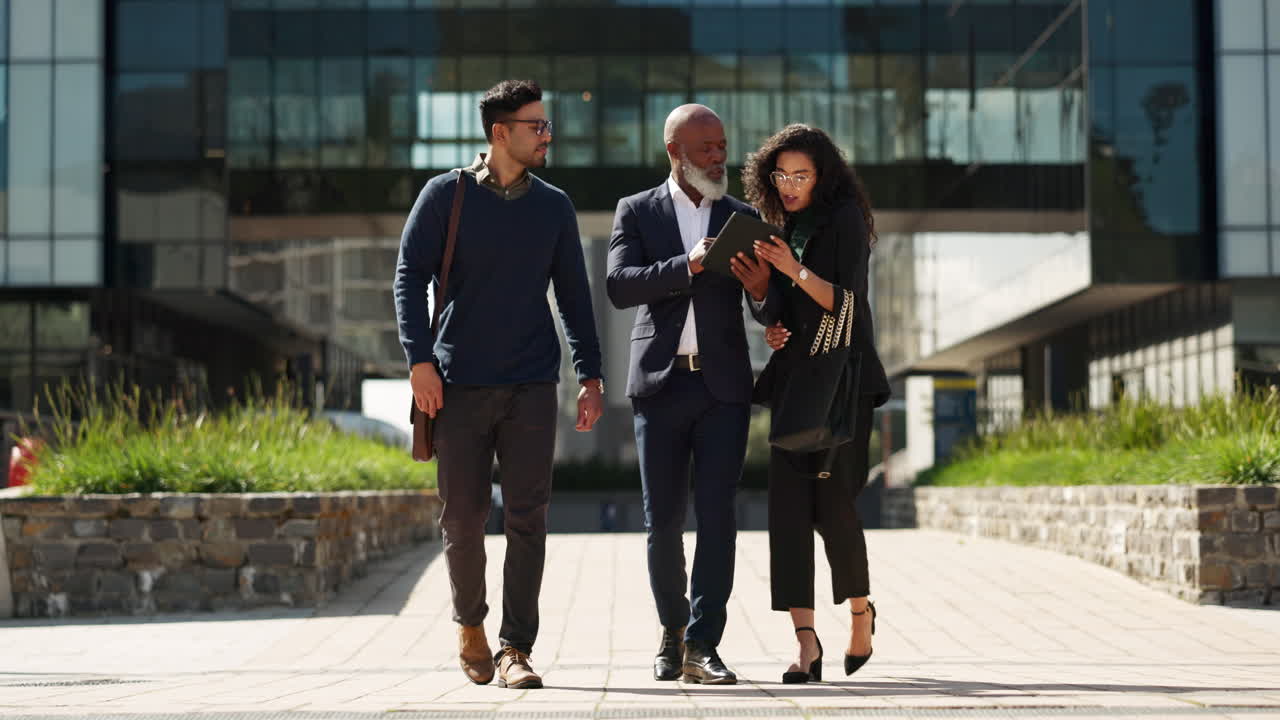 Walking, talking and business people with a tablet