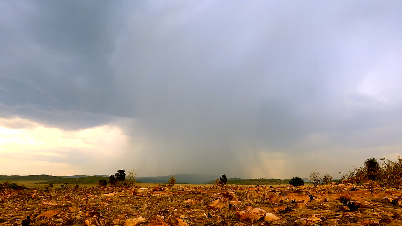 Ominous electrical storm move over African savannah escarpment, time lapse