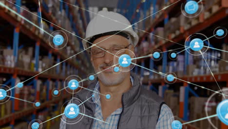 Animation-of-network-of-connections-over-caucasian-man-working-in-warehouse