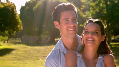 Romantic-couple-standing-in-the-park