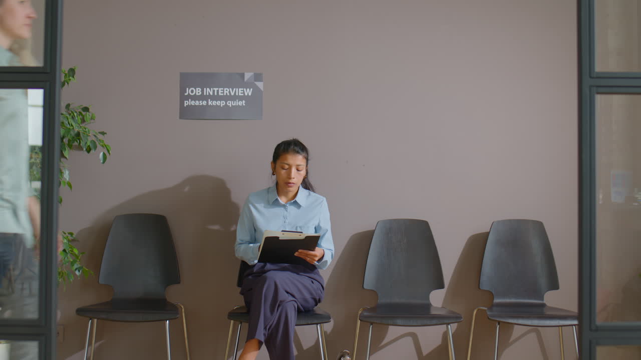 Hispanic Businesswoman Waiting for Job Interview