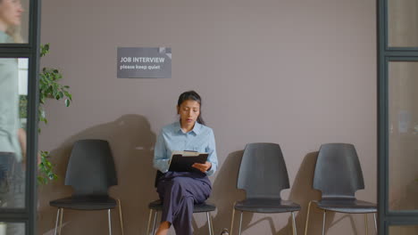 hispanic businesswoman waiting for job interview