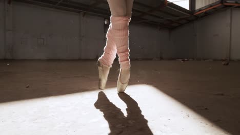 female dancer in an empty warehouse