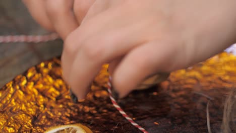 florist at work. how to make christmas wreath with floral arrangement. step by step, tutorial