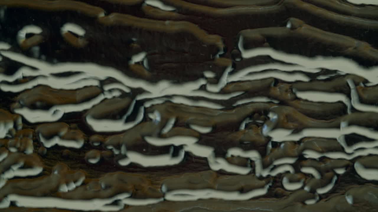 추상 수치가 있는 아크릴 유리의 매크로 샷