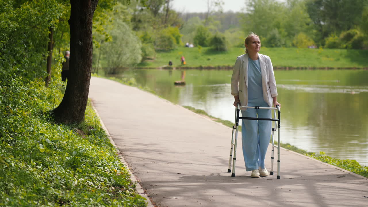 Woman with a walker in a park